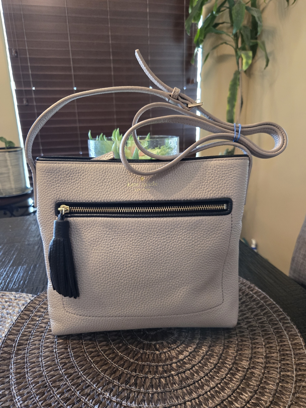kate spade Pebbled Light Taupe Crossbody with Black Trim and Tassel